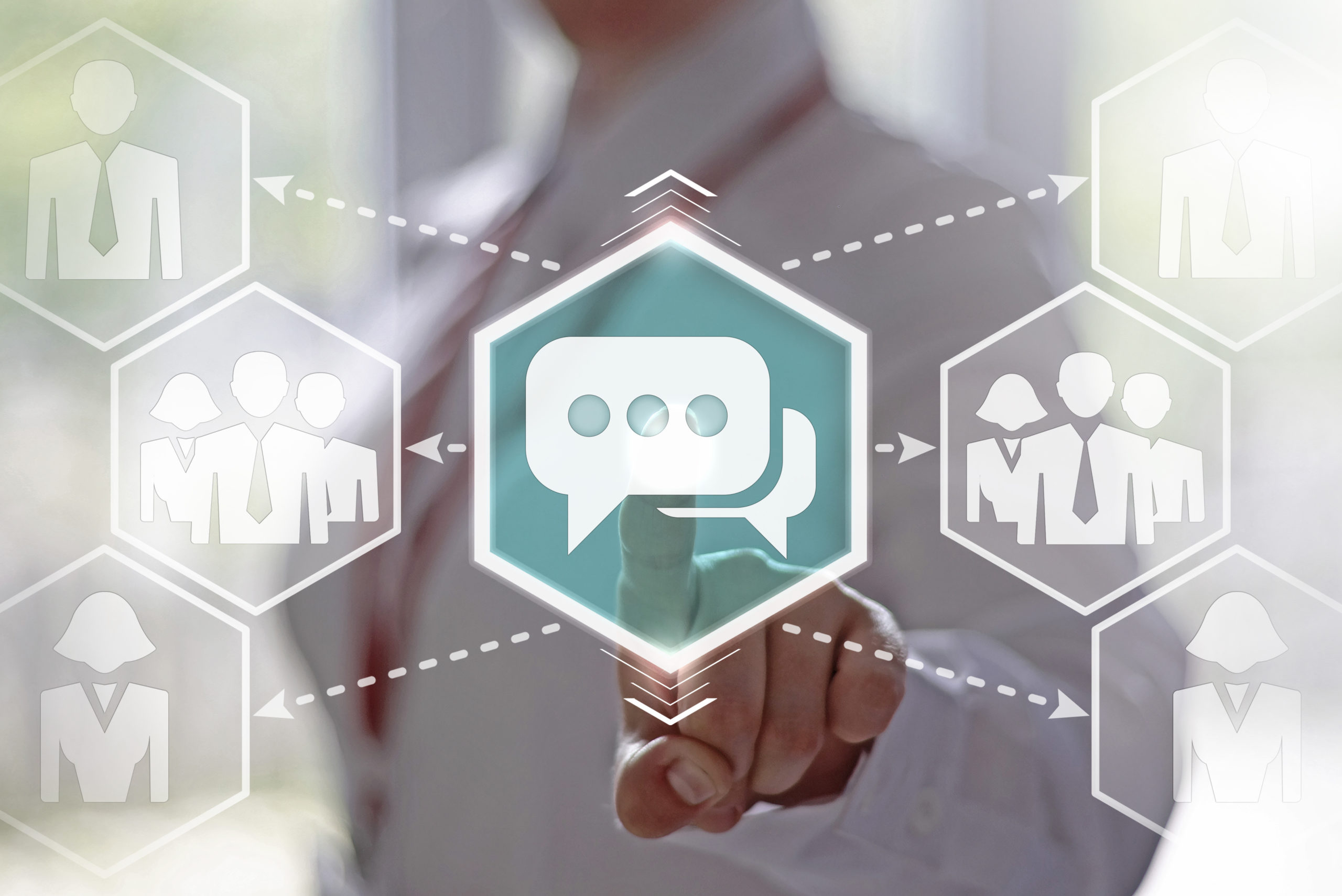 Business, finance, technology and internet concept - businesswoman presses the speech bubbles on virtual screens. Business message on a touch screen interface. Email, icon, sign, mail, communication.
